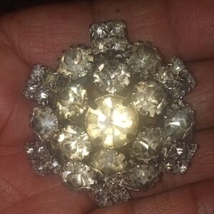 Vintage Silver Starburst Brooch with Crystal Highlights